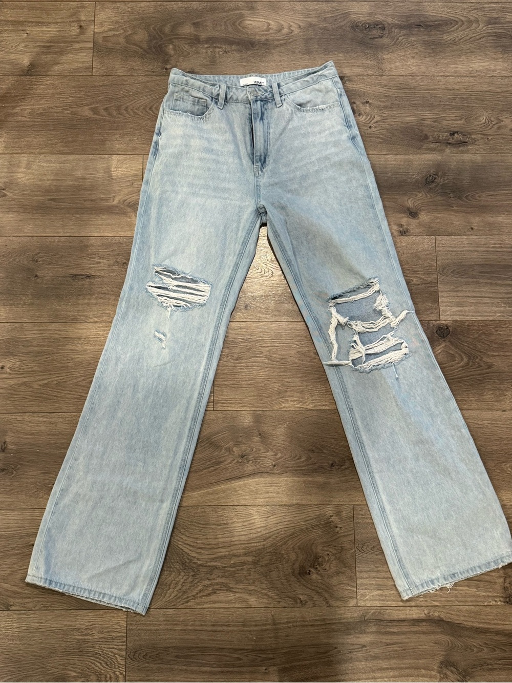 Vervet distressed boot cut high rise jeans.